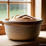 전통식품의 제조 기술 - The Sourdough Artisan's Kitchen**
A cozy, rustic kitchen scene bathed in warm, soft natural light s...
